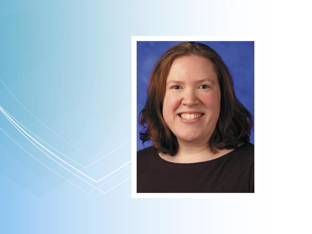 A head and shoulders professional portrait of Abbey Fisher.